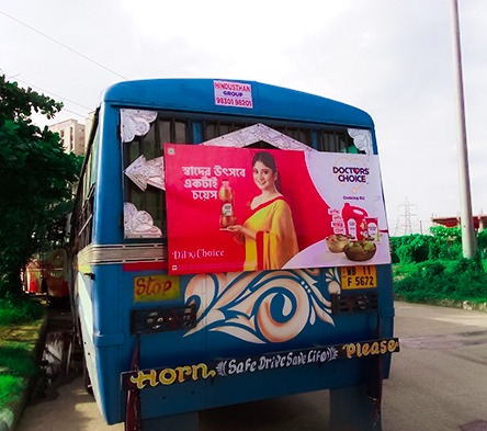 Colorful bus branding campaign in Kolkata