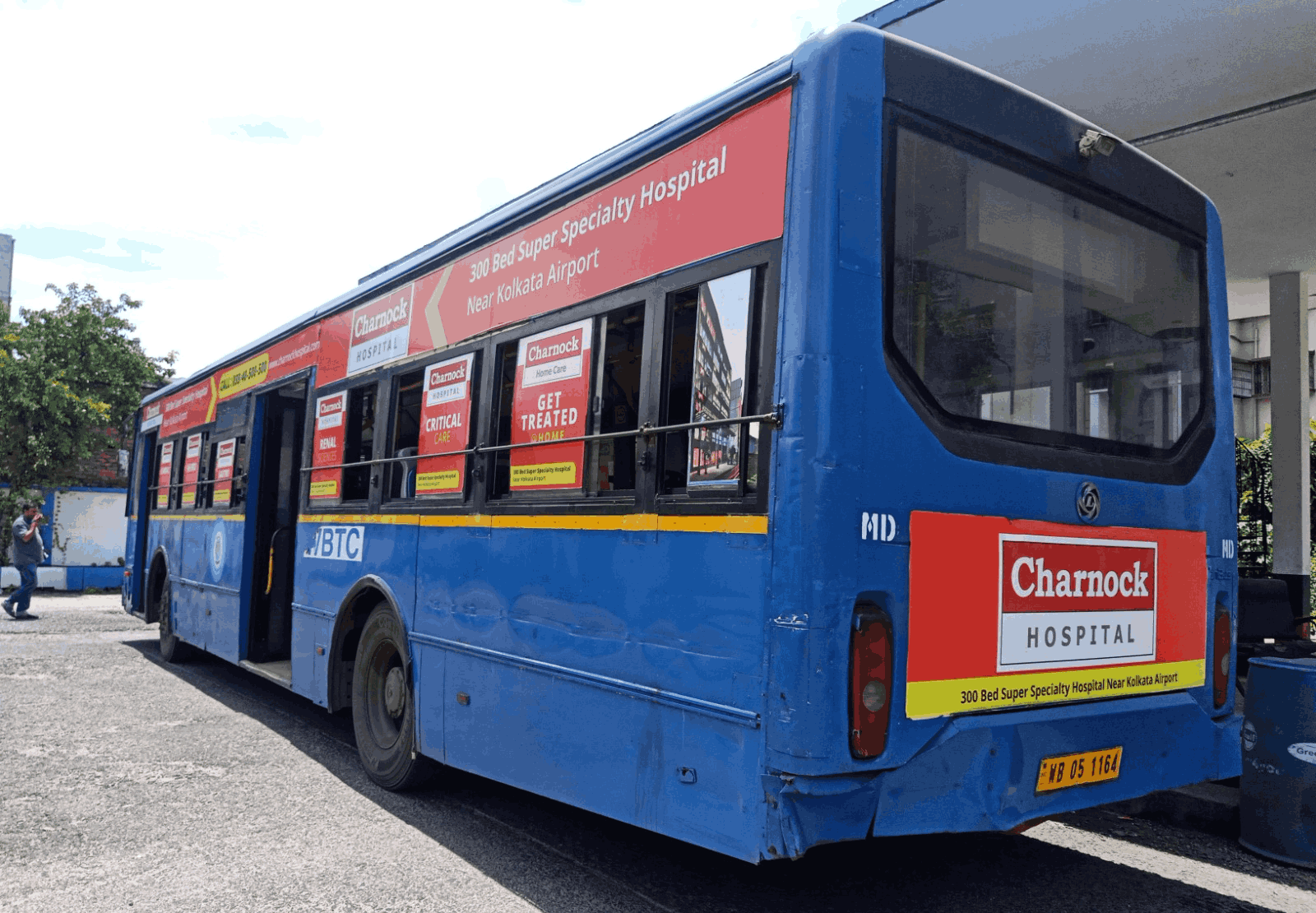 Bus branding advertisement showcasing vibrant graphics